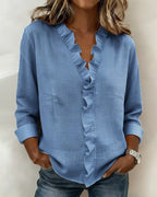 Anora |  Blusa con volantes y cuello en V